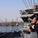 USS George H.W. Bush Sailor stands lookout watch