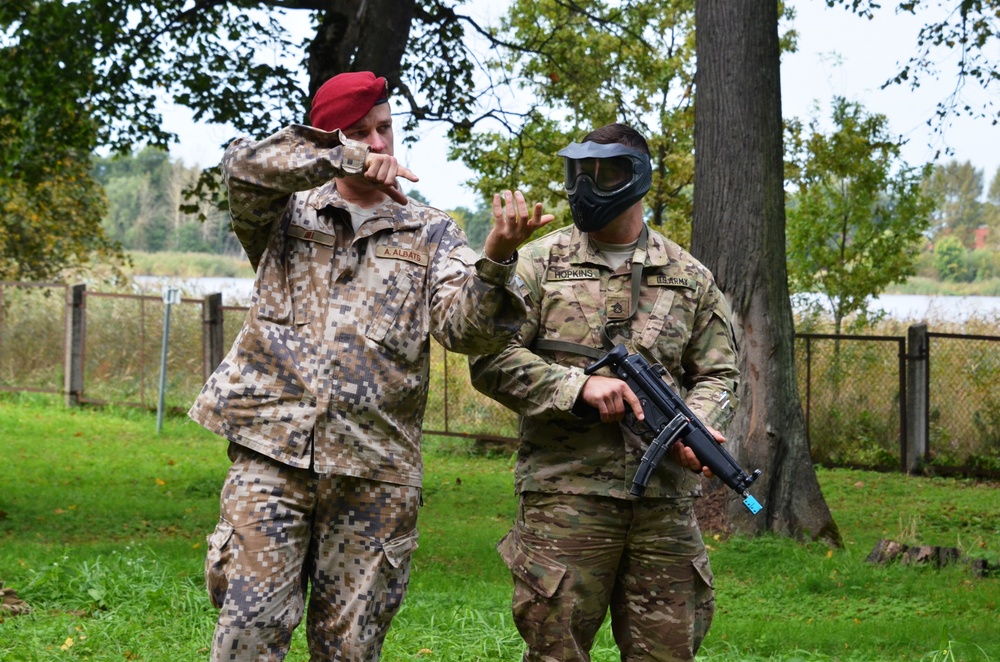 Michigan Soldiers behind Latvian triggers
