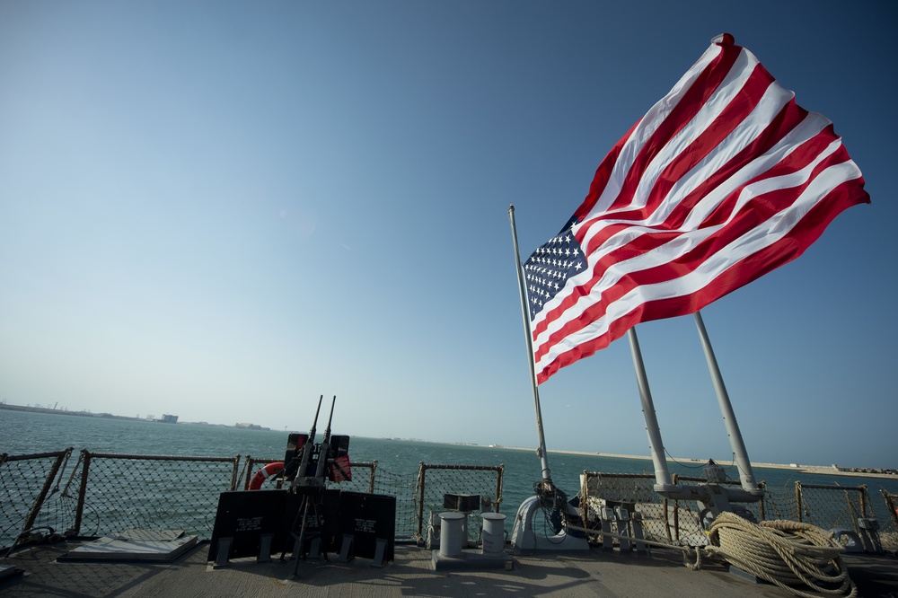 USS Arleigh Burke flies the national ensign at half-mast on 9/11