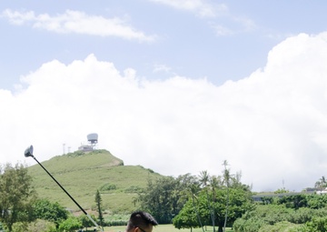 Teeing off at Commander's Cup Golf Tournament