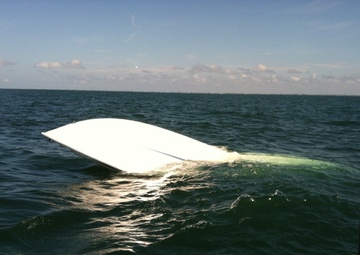 Coast Guard assists partner agencies after boat capsizes