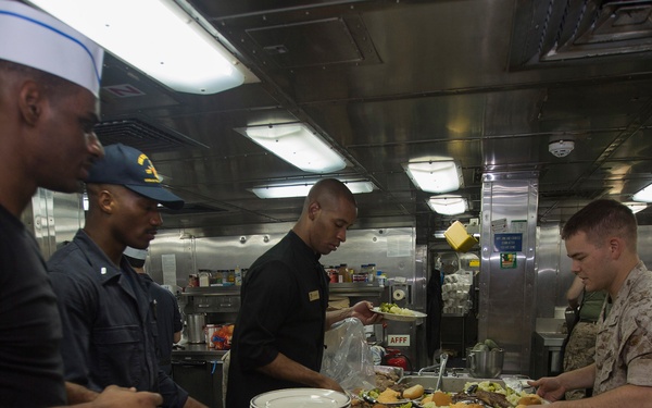 Corporal course Marines hold mess night aboard Mesa Verde