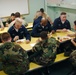 Sailors and Sea Cadets share dinner