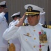 Cmdr. Joseph DiGuardo salutes during the change of command ceremony