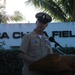 Chief Petty Officer Larry Thomas reads a short history about attack on Pearl Harbor