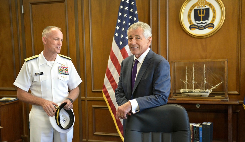 Secretary of Defense visits with president of the US Naval War College