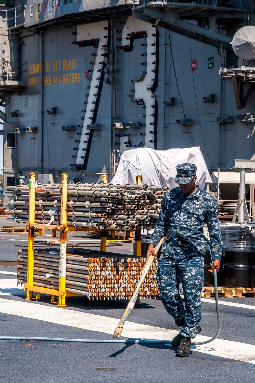 USS George Washington sailor at work