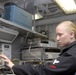 USS Nimitz sailor at work