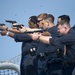 Sailors conduct weapons qualification course aboard USS Arleigh Burke