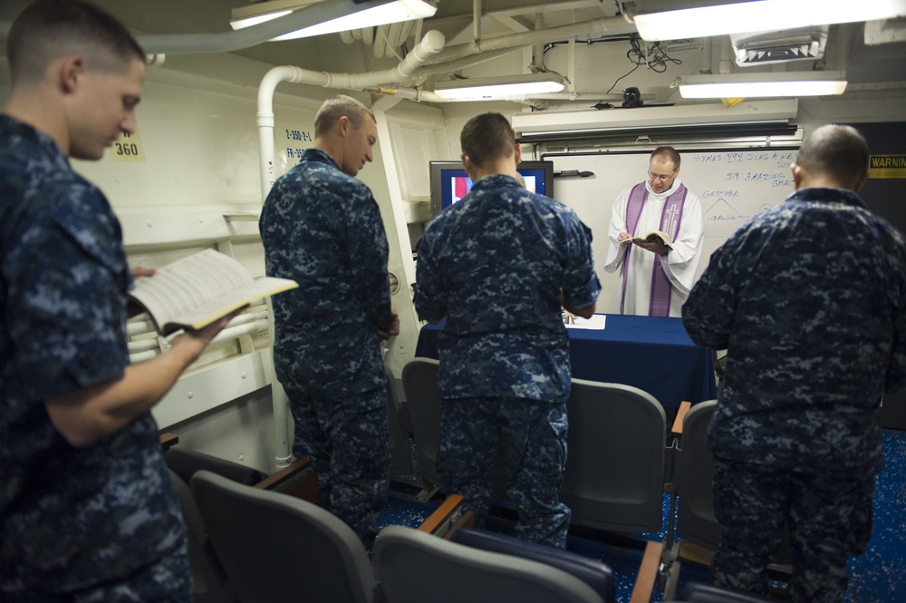 Canadian forces army chaplain leads service aboard USS Arleigh Burke