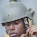 USS George H.W. Bush sailor puts on helmet