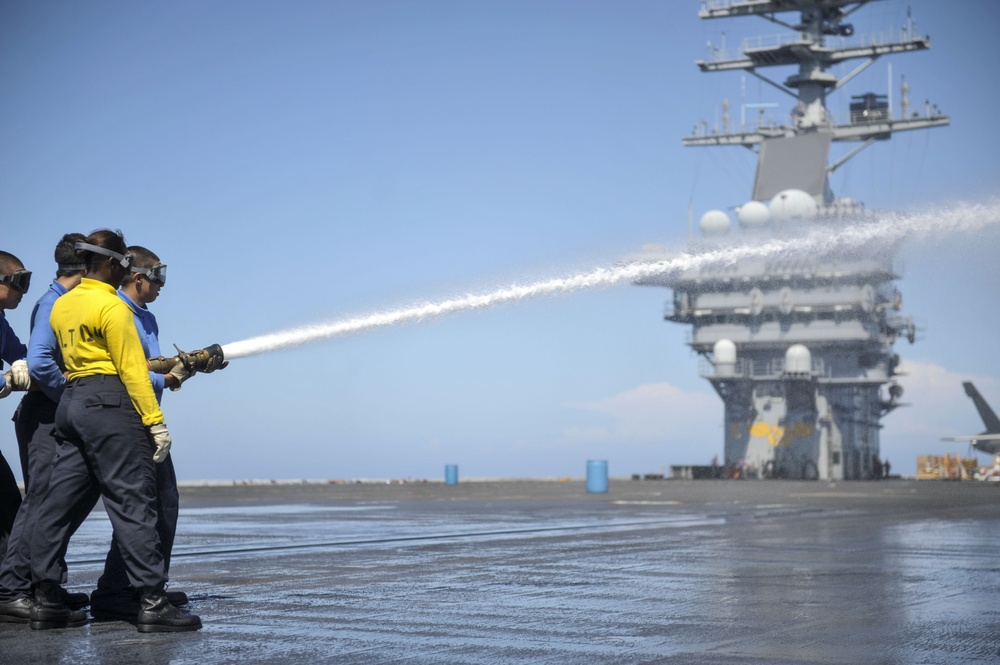 USS Nimitz flight deck scrub