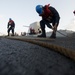 Sailors at work during replenishment at sea