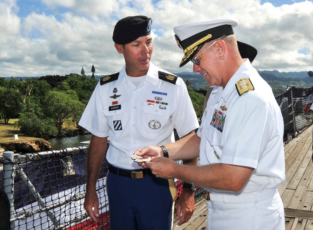 Re-enlistee receives command coin
