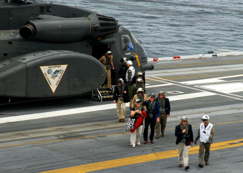 Former President George H.W. Bush arrives aboard the aircraft carrier USS George H.W. Bush