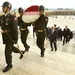 Preparing to lay wreath