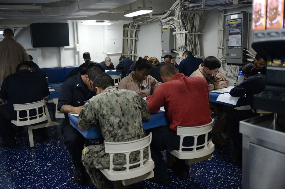 Sailors take E-4 exam