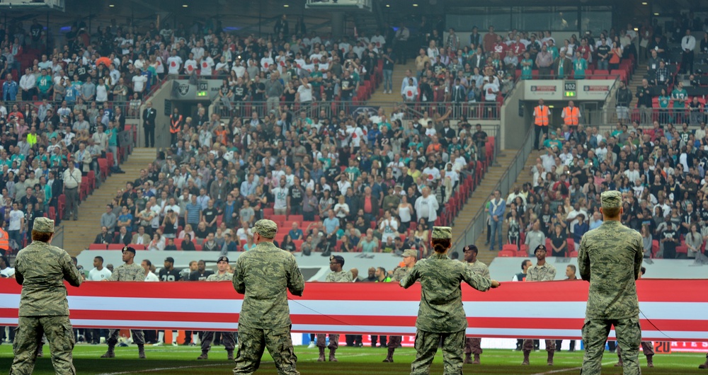 Liberty Airmen present flags at Wembley Stadium