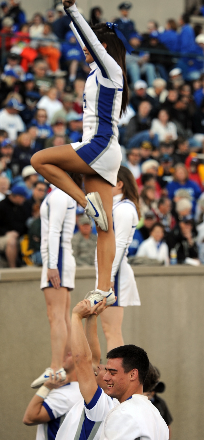 Air Force cheerleading team performs during Air Force vs. Army football game