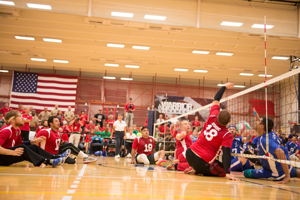 Sitting volleyball: Marines, Airmen square off in battle of undefeated teams at 2014