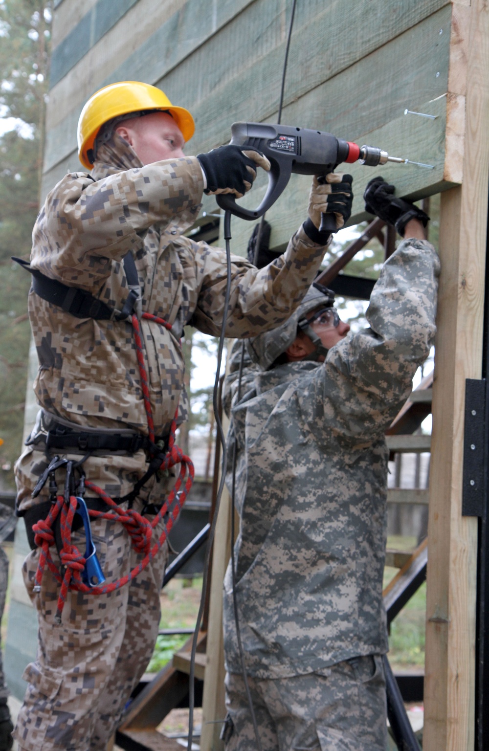 Latvian and US engineers construct a rappel tower