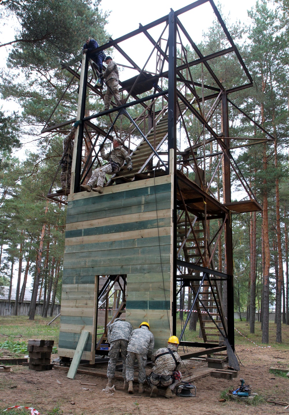 Latvian and US engineers construct a rappel tower