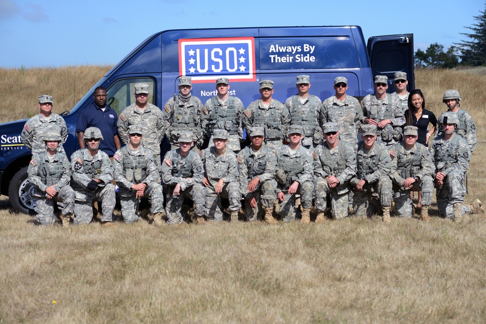 Competitors pose for a photo during Best Warrior event