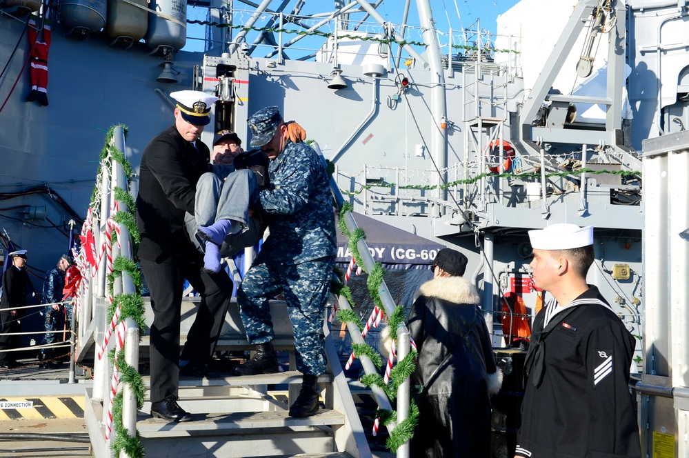 Retired Chief Warrant Officer Thomas Rupert visits USS Normandy