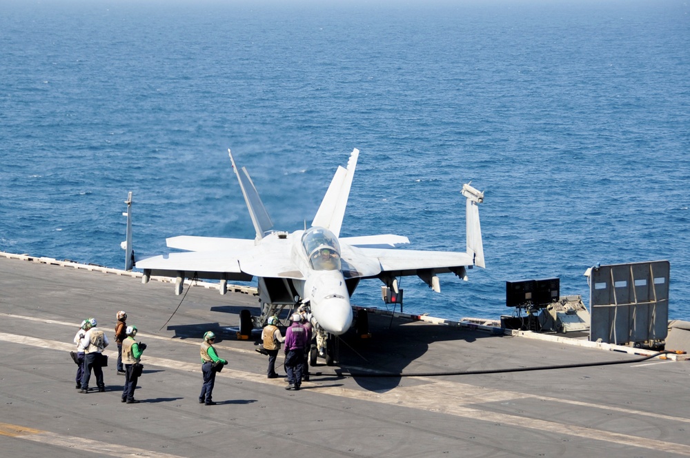 Aboard the aircraft carrier USS George H.W. Bush