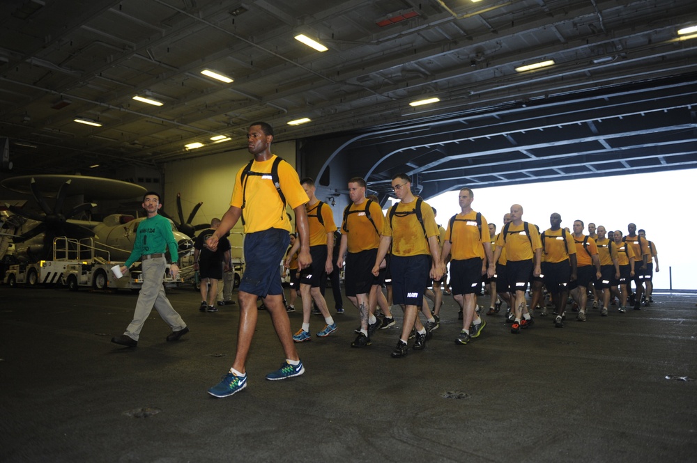 USS George H.W. Bush CPO selectees participate in marching drills