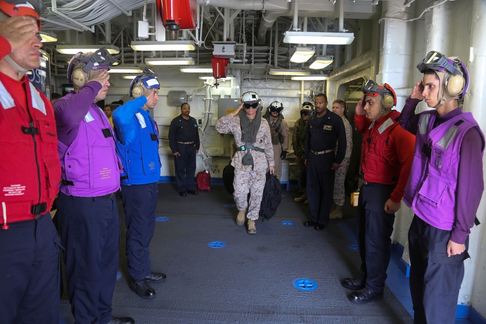 Brig. Gen. Mundy departs the USS Makin Island
