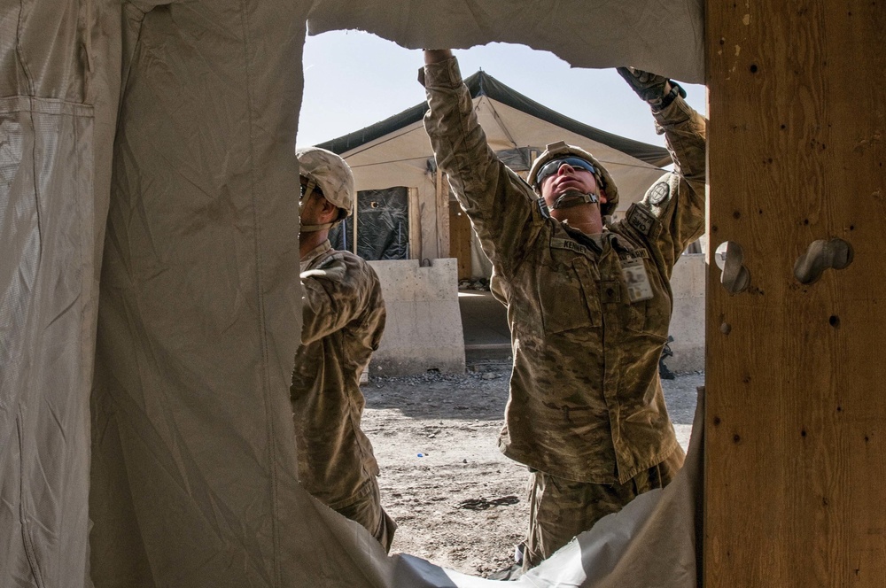 220th Engineer Co. disassembles uninhabited living areas in preparation for Resolute Support