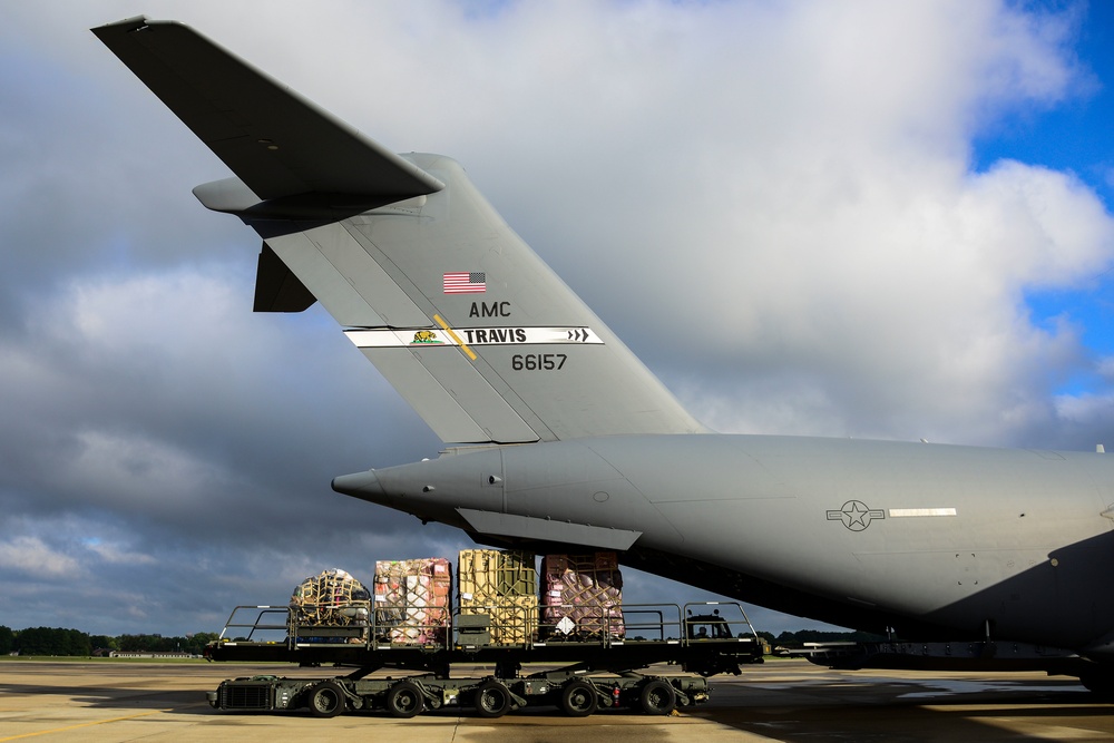 Airmen deploy to deliver Ebola treatment facility with U.S. relief package