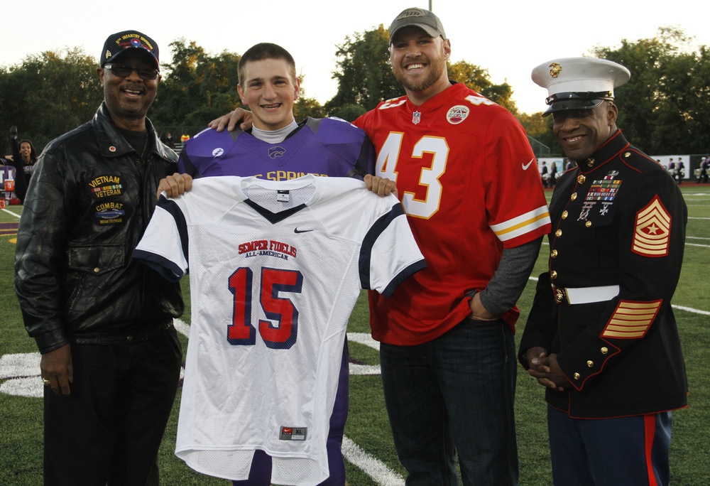 Blue Springs High School long snapper presented jersey for 2015 Semper Fidelis All-American Bowl