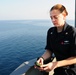 George H.W. Bush sailor measures temperature