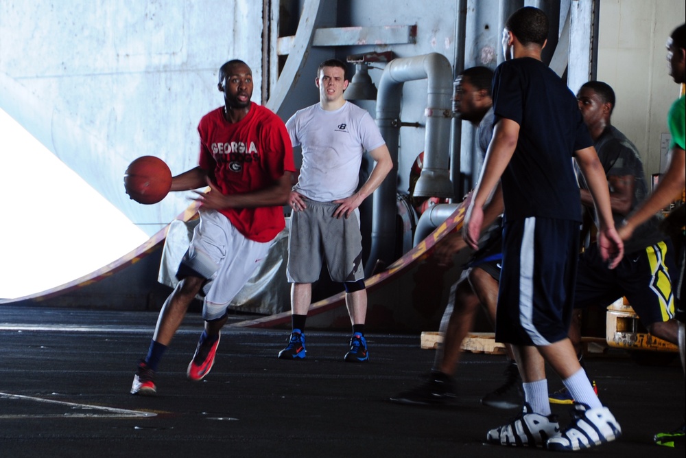 USS George H.W. Bush sailors play basketball