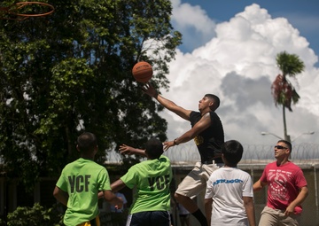 Service members share day off with kids of DYA