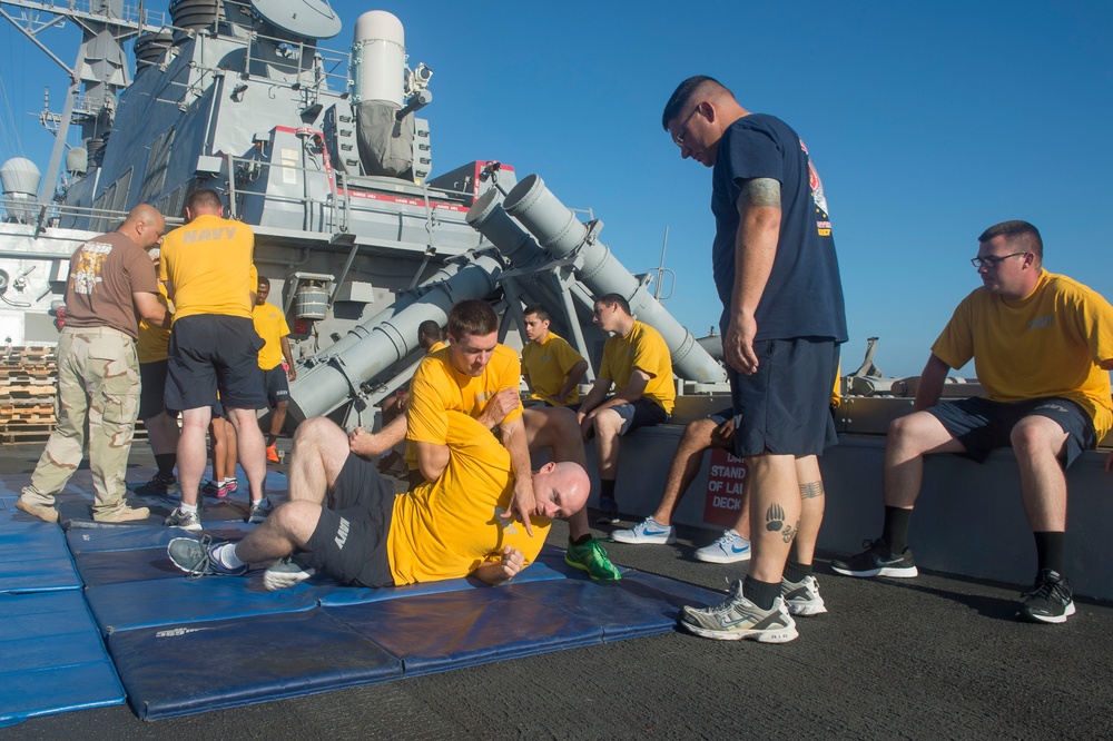 USS Cole Sailors conduct arrest and detainment training