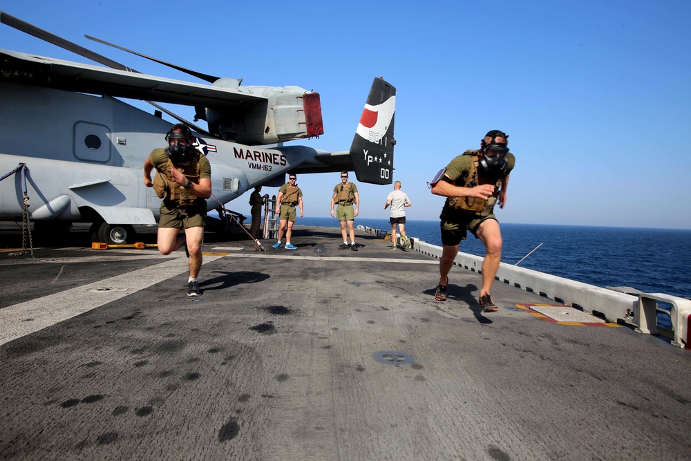 Performing sprints with gas masks