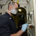 USS Mesa Verde sailor at work