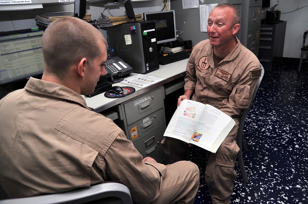 USS George H.W. Bush sailors at work