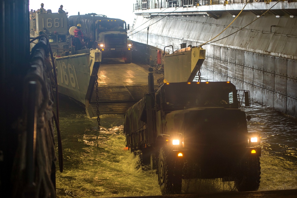 Marines from the 24th MEU offload from a landing craft unit
