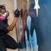 USS George H.W. Bush Sailor paints a mural