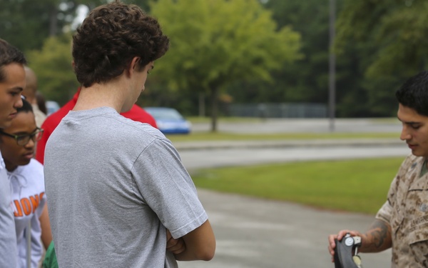 Marines, Robots, high school students