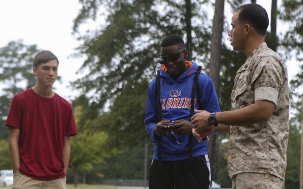 Marines, Robots, high school students