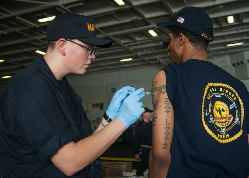 USS Carl Vinson Sailor receives flu vaccine