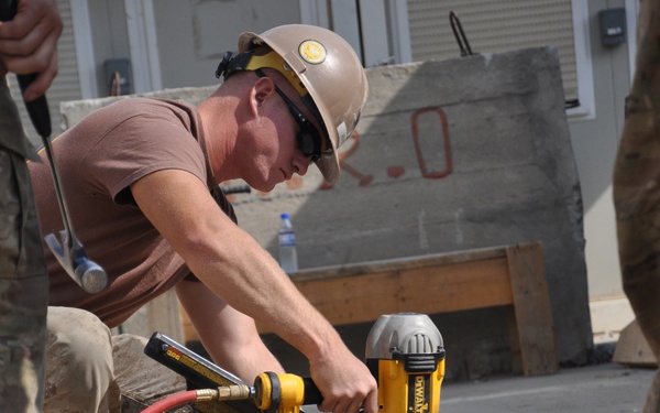 Seabees and Soldiers take on roofing project