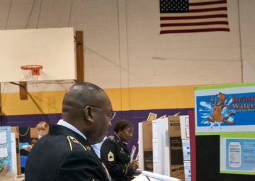 Army Reserve Soldiers volunteer to judge children’s science fair
