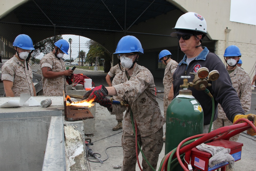 Marines learn to cut through crisis with Urban Search and Rescue Training