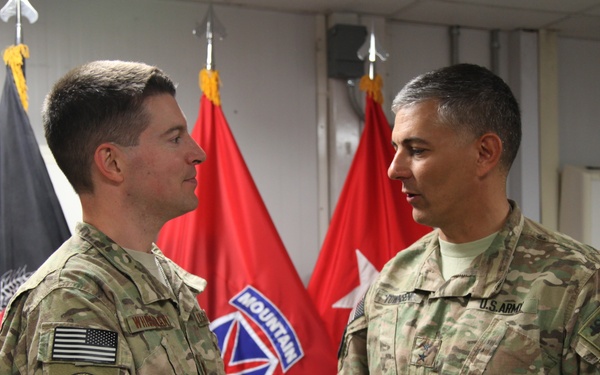Maj. Robert Whisenant coined by Maj. Gen. Stephan Townsend on Bargram Air Field